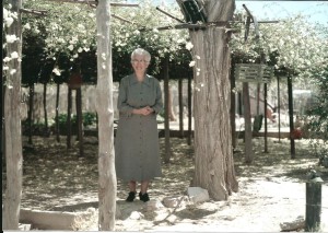 9 Ethel Macia under Rosebush 1954